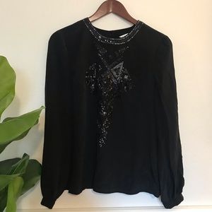Trina Turk black silk top with decorative detail